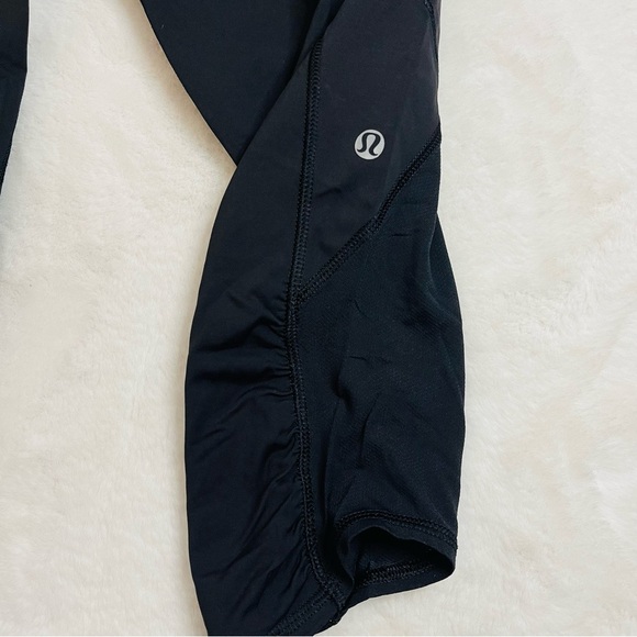 lululemon Cropped Black and Pink Floral Waistband Leggings - Picture 3 of 10